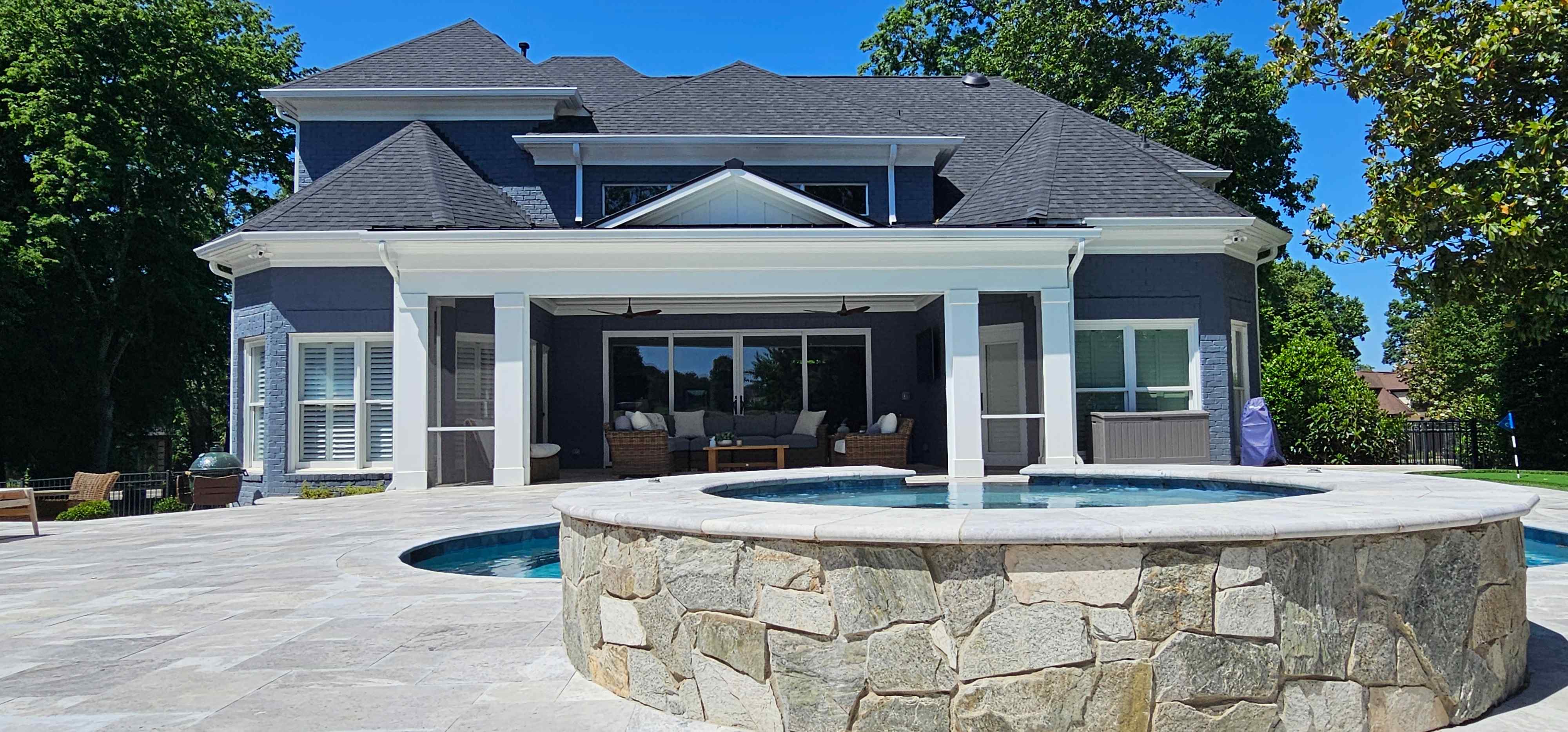 Screened porch with power screens, ceiling heaters and a metal roof in Cornelius, NC
