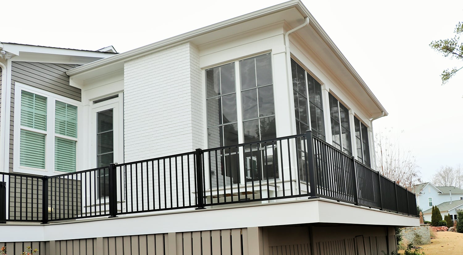 Screened porch with Eze-Breeze screen system and Trex flooring